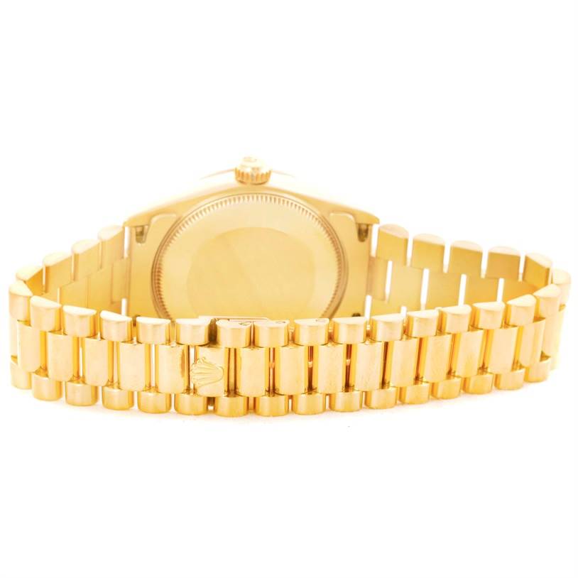 The image shows the back and bracelet of a Rolex President 68278 Women's Yellow Gold Champagne Dial 68278 Women's Yellow Gold Champagne Dial model watch at a rear angle.