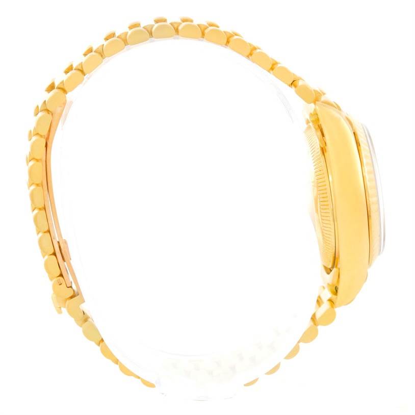 The Rolex President 69178 Women's Yellow Gold Black Dial 69178 Women's Yellow Gold Black Dial watch is displayed from a side angle, showcasing its gold bracelet and partially visible case.