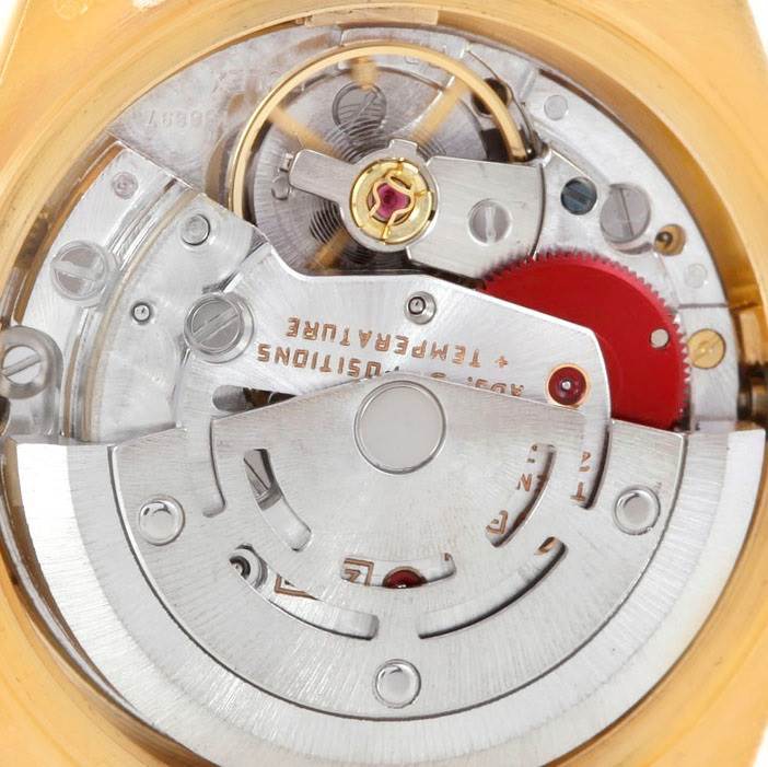 This image shows the internal mechanical movement of a Rolex President 69178 Women's Yellow Gold Black Dial 69178 Women's Yellow Gold Black Dial model watch from a close-up angle.