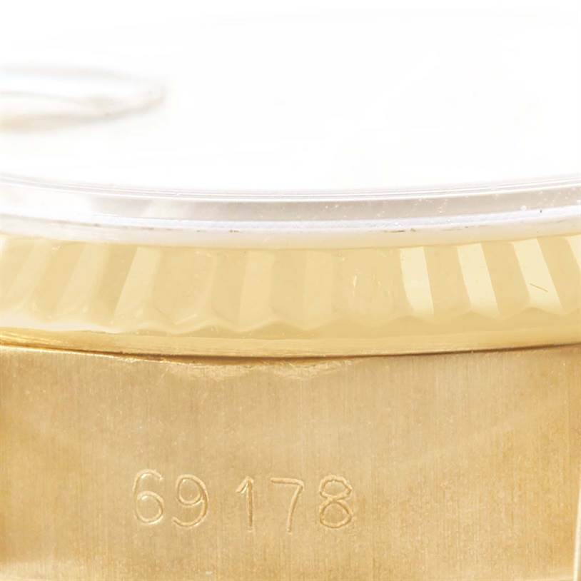 This image shows a close-up of the case side and bezel of a Rolex President 69178 Women
s Yellow Gold Champagne Dial 69178 Women
s Yellow Gold Champagne Dial model watch, displaying the model number 69178.