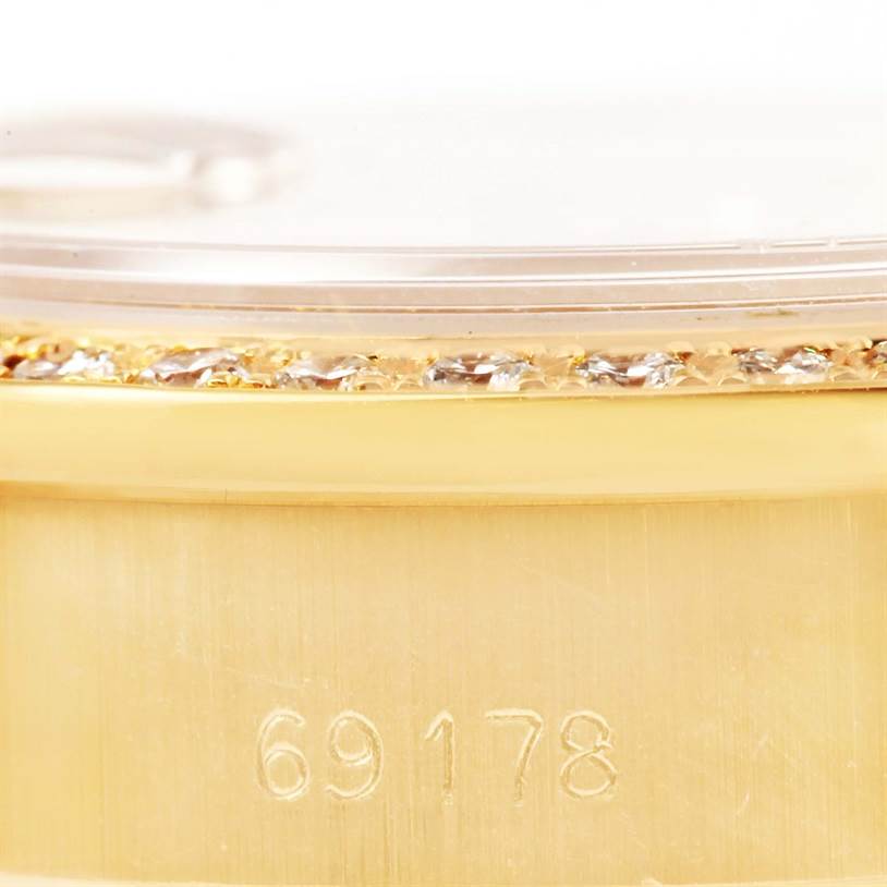 Close-up of the Rolex President 69178 Women's Yellow Gold Champagne Dial 69178 Women's Yellow Gold Champagne Dial watch, showing its model number 69178 on the gold case with diamond-set bezel.