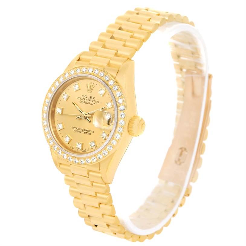 The image shows a side angle view of a gold Rolex President 69178 Women's Yellow Gold Champagne Dial 69178 Women's Yellow Gold Champagne Dial model watch, displaying its bezel, dial, crown, and bracelet.