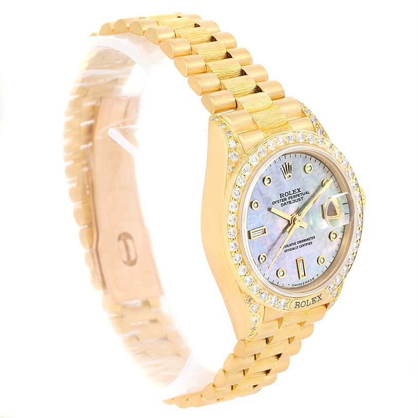 The image shows a Rolex President 69158 Women's Yellow Gold Mother of Pearl Dial 69158 Women's Yellow Gold Mother of Pearl Dial model watch at a front-side angle, displaying its face, bezel, and bracelet.
