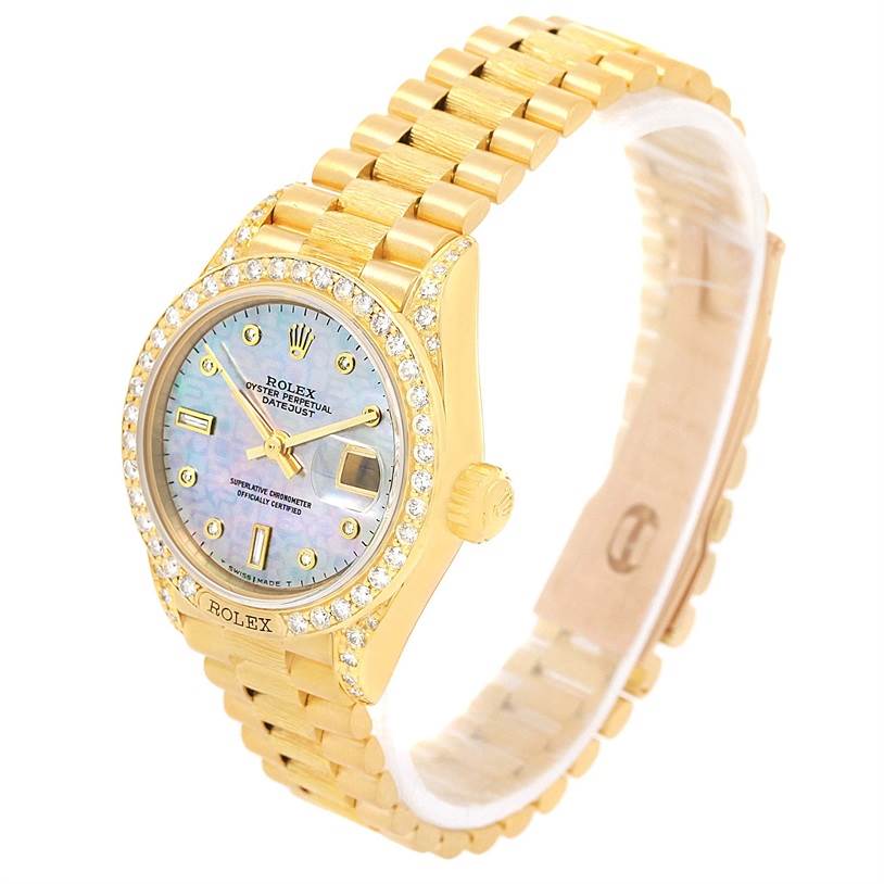 The Rolex President 69158 Women's Yellow Gold Mother of Pearl Dial 69158 Women's Yellow Gold Mother of Pearl Dial model watch is shown at an angle displaying the face, bezel, crown, and bracelet.