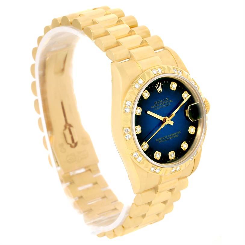 This image shows a side-angle view of a Rolex President 68258 Women's Yellow Gold Blue Dial 68258 Women's Yellow Gold Blue Dial model watch, featuring its gold band and blue dial with diamond markers.