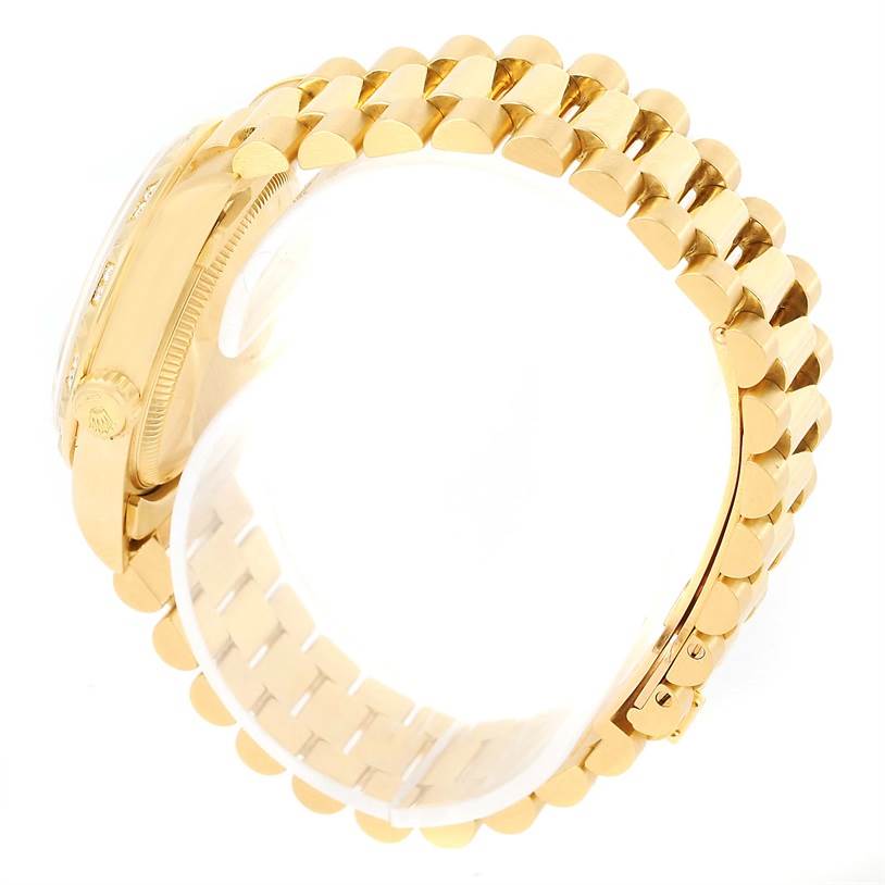 The image shows a side view of the Rolex President 68258 Women's Yellow Gold Blue Dial 68258 Women's Yellow Gold Blue Dial model watch, focusing on its gold bracelet and partially visible case and crown.