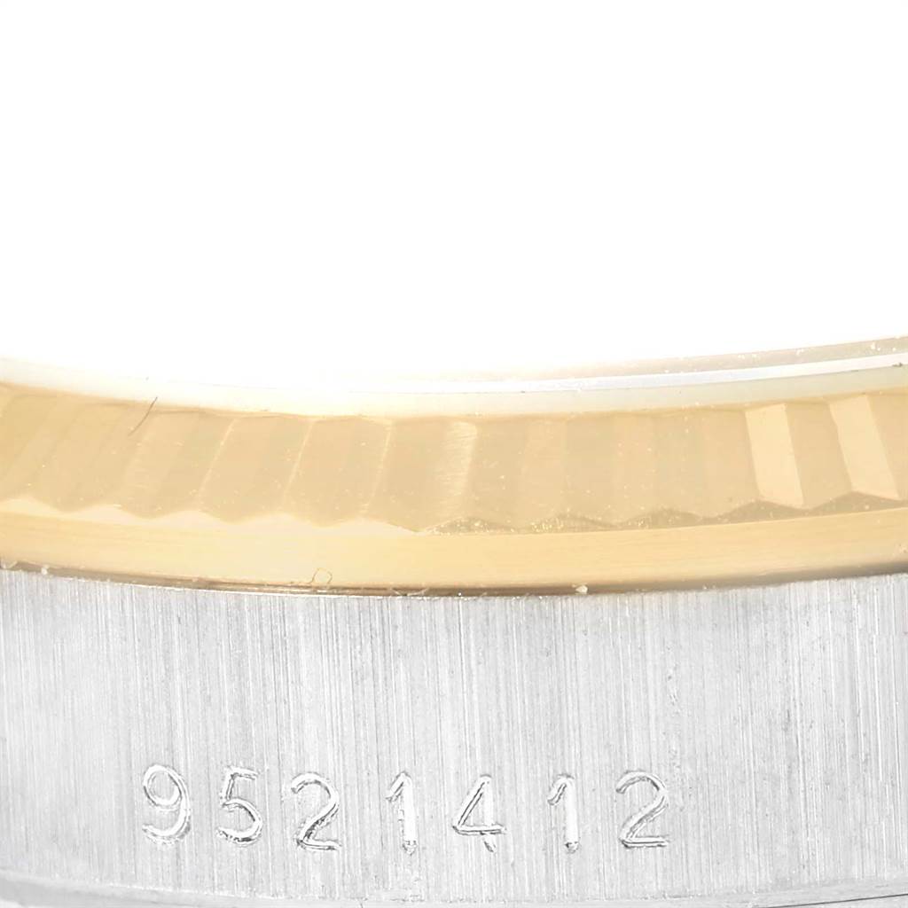 This image shows a close-up of the bezel and part of the caseback of a Rolex President 68279B Women's White Gold Brown Dial 68279B Women's White Gold Brown Dial model watch.