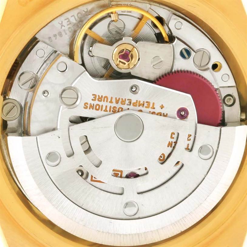 This image shows the intricate inner mechanism of the Rolex President 69078 Women's Yellow Gold Champagne Dial 69078 Women's Yellow Gold Champagne Dial model watch from a close-up, rear angle.