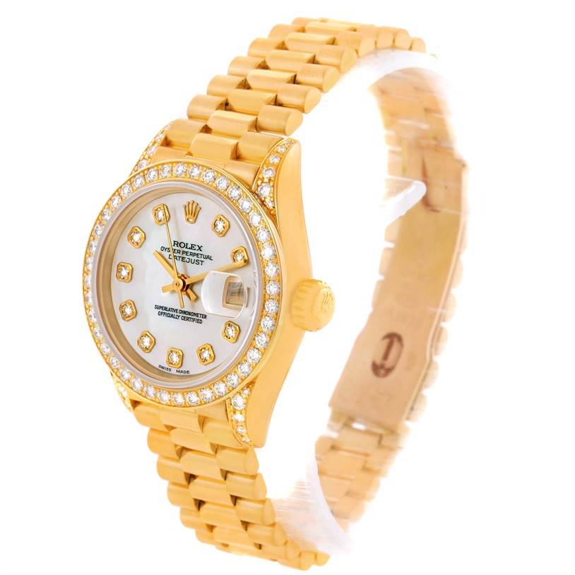 The image shows a Rolex President 69158 Women's Yellow Gold Mother of Pearl Dial 69158 Women's Yellow Gold Mother of Pearl Dial model watch angled to display the face, bezel, crown, and part of the bracelet.