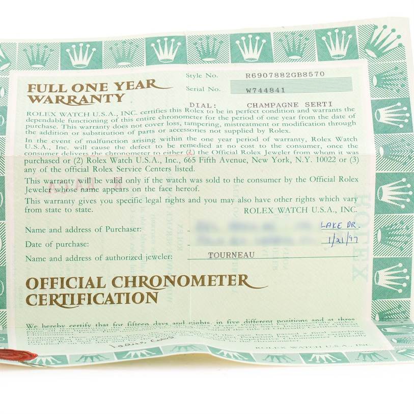 The image shows a warranty card for a Rolex President 69078 Women's Yellow Gold Champagne Dial 69078 Women's Yellow Gold Champagne Dial model watch, detailing purchase and warranty information.