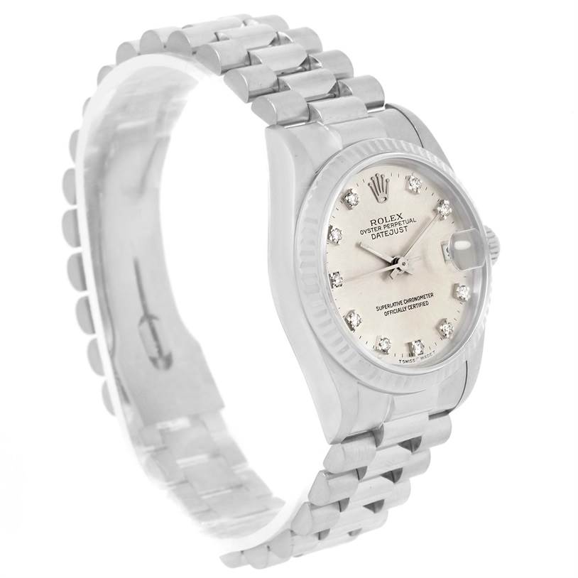 The Rolex President 68279 Women's White Gold Silver Dial 68279 Women's White Gold Silver Dial model watch is shown at an angled side view, highlighting its band, face, and diamond hour markers.