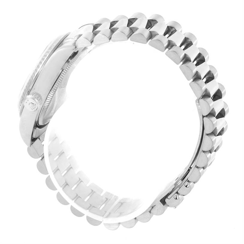 The image shows a side view of a Rolex President 68279 Women's White Gold Silver Dial 68279 Women's White Gold Silver Dial model watch, highlighting the bracelet and crown.