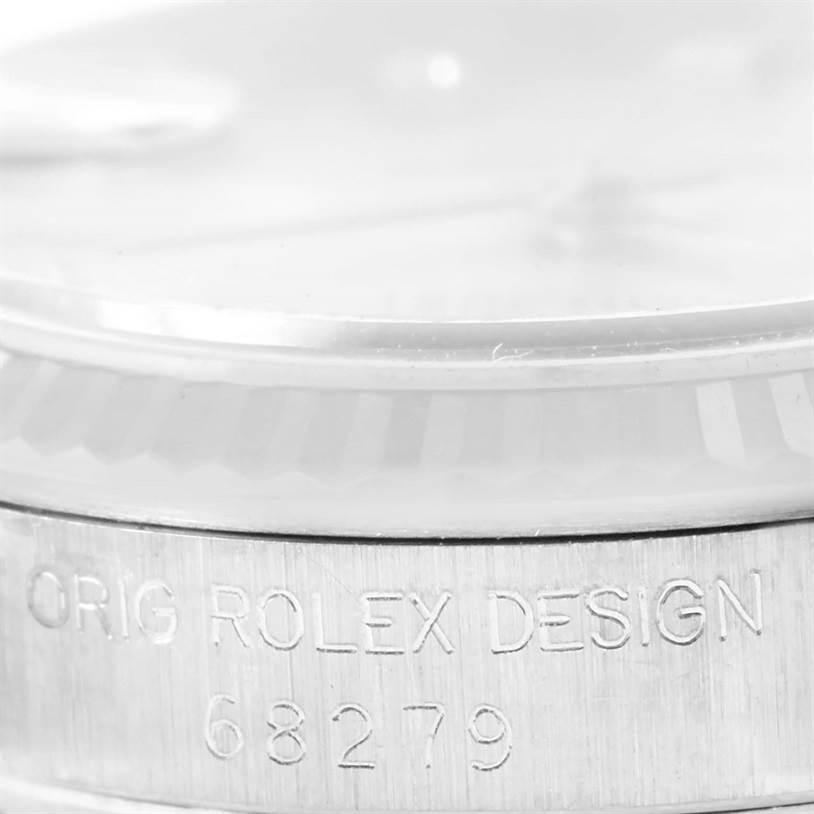 The image shows a close-up of the side of a Rolex President 68279 Women's White Gold Silver Dial 68279 Women's White Gold Silver Dial watch, highlighting the model number and "Orig Rolex Design" engraving.