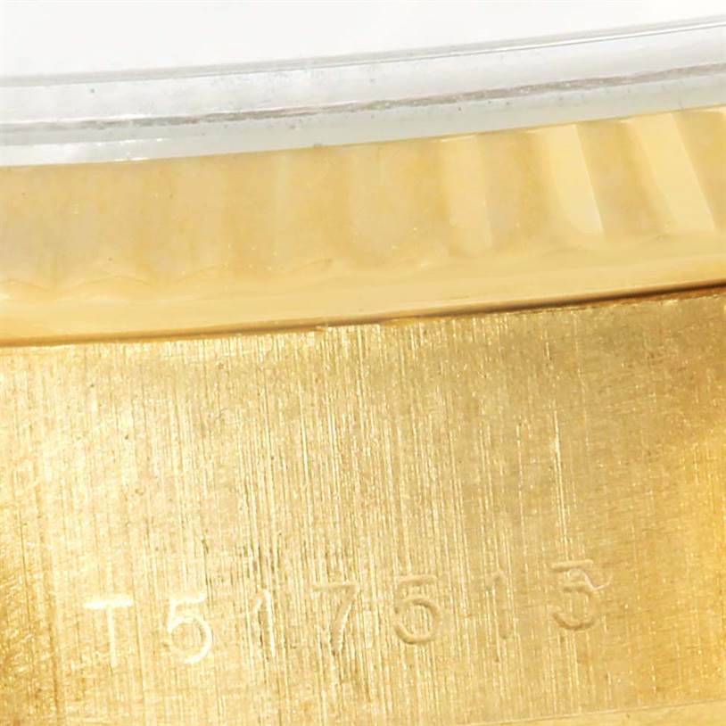Close-up view of the case side with visible serial numbers on the Rolex President 69178 Women's Yellow Gold White Dial 69178 Women's Yellow Gold White Dial model.