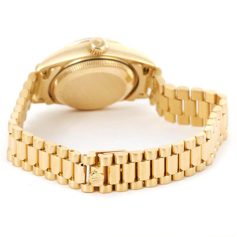 This image shows the back case and bracelet of the Rolex President 69178 Women's Yellow Gold White Dial 69178 Women's Yellow Gold White Dial model watch from a rear angle.