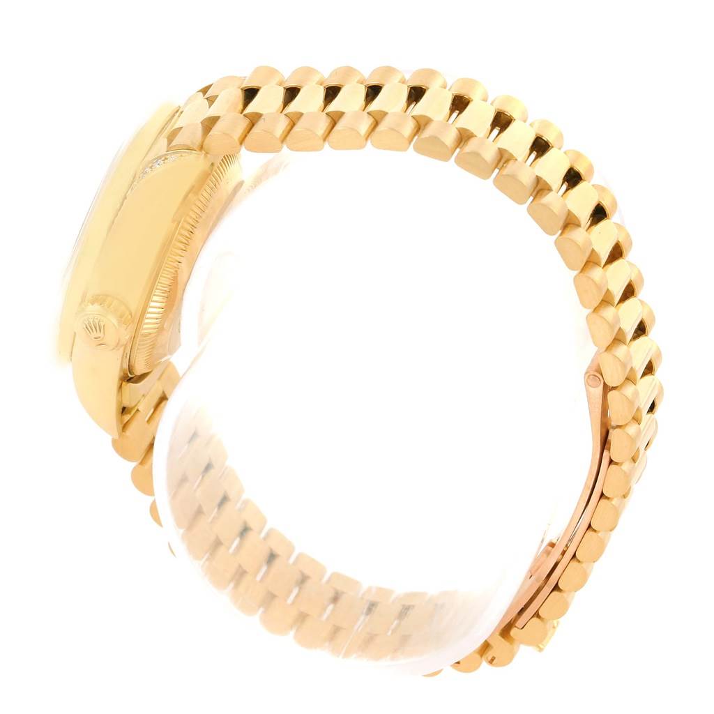 The image shows a side view of the Rolex President 69158 Men
s Yellow Gold Champagne Dial 69158 Men
s Yellow Gold Champagne Dial model watch, highlighting its case, crown, and bracelet.