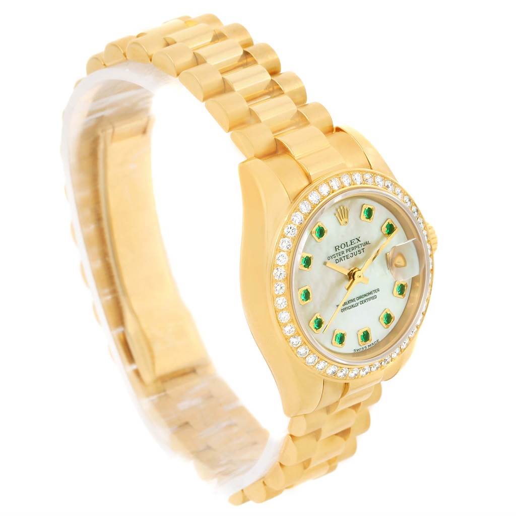 The image shows a Rolex President 179138 Women's Yellow Gold Mother of Pearl Dial 179138 Women's Yellow Gold Mother of Pearl Dial model watch at a three-quarter angle, highlighting the face, gold bracelet, and diamond bezel.