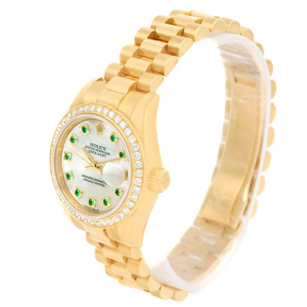 This image shows a Rolex President 179138 Women's Yellow Gold Mother of Pearl Dial 179138 Women's Yellow Gold Mother of Pearl Dial model watch at an angled side view, highlighting its bracelet, bezel, and dial.