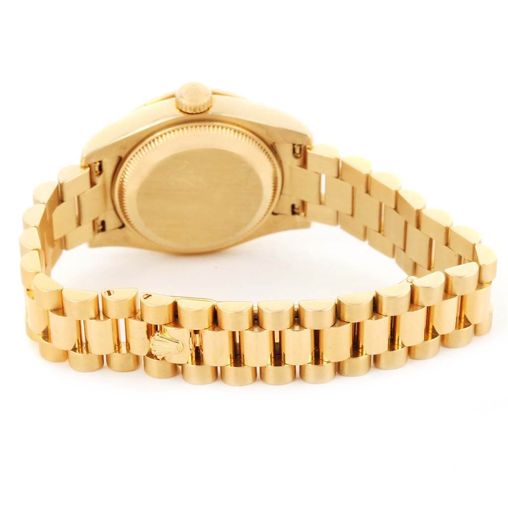 The image shows the back case and bracelet of a Rolex President 179138 Women's Yellow Gold Mother of Pearl Dial 179138 Women's Yellow Gold Mother of Pearl Dial model watch at a slight angle.