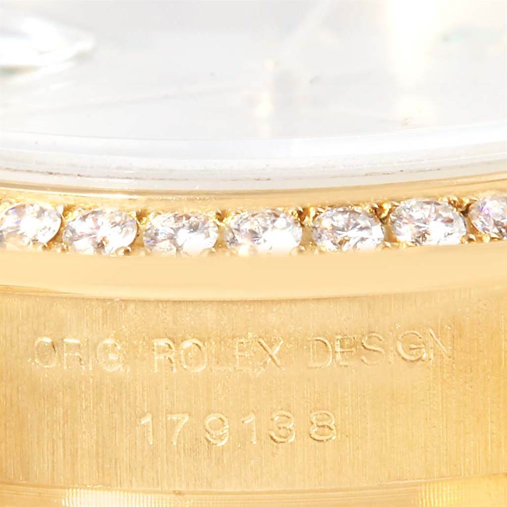 The image shows a close-up of the diamond-studded bezel and case side of a Rolex President 179138 Women's Yellow Gold Mother of Pearl Dial 179138 Women's Yellow Gold Mother of Pearl Dial model, highlighting the "ORIG ROLEX DESIGN" engraving.