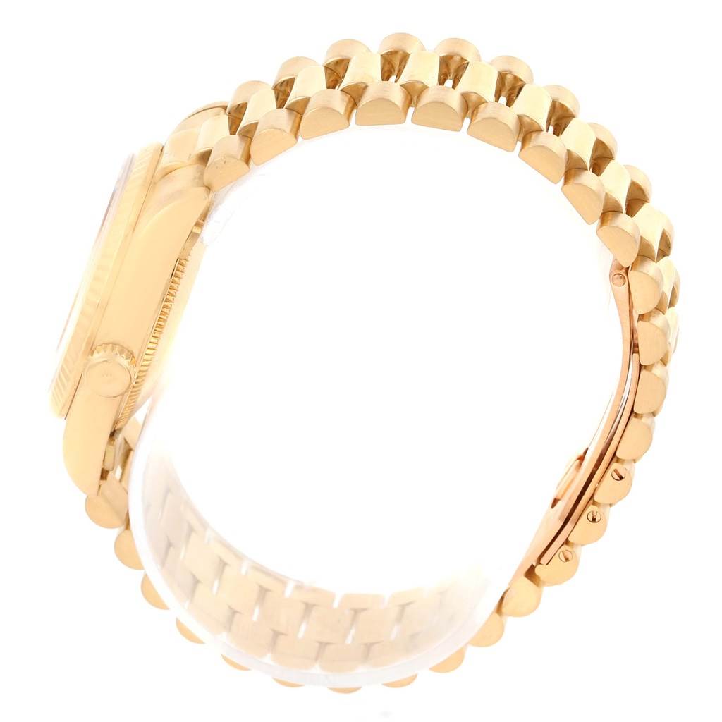 This image displays the side view of a Rolex President 68278 Women's Yellow Gold White Dial 68278 Women's Yellow Gold White Dial model watch, focusing on its gold bracelet and part of the case.