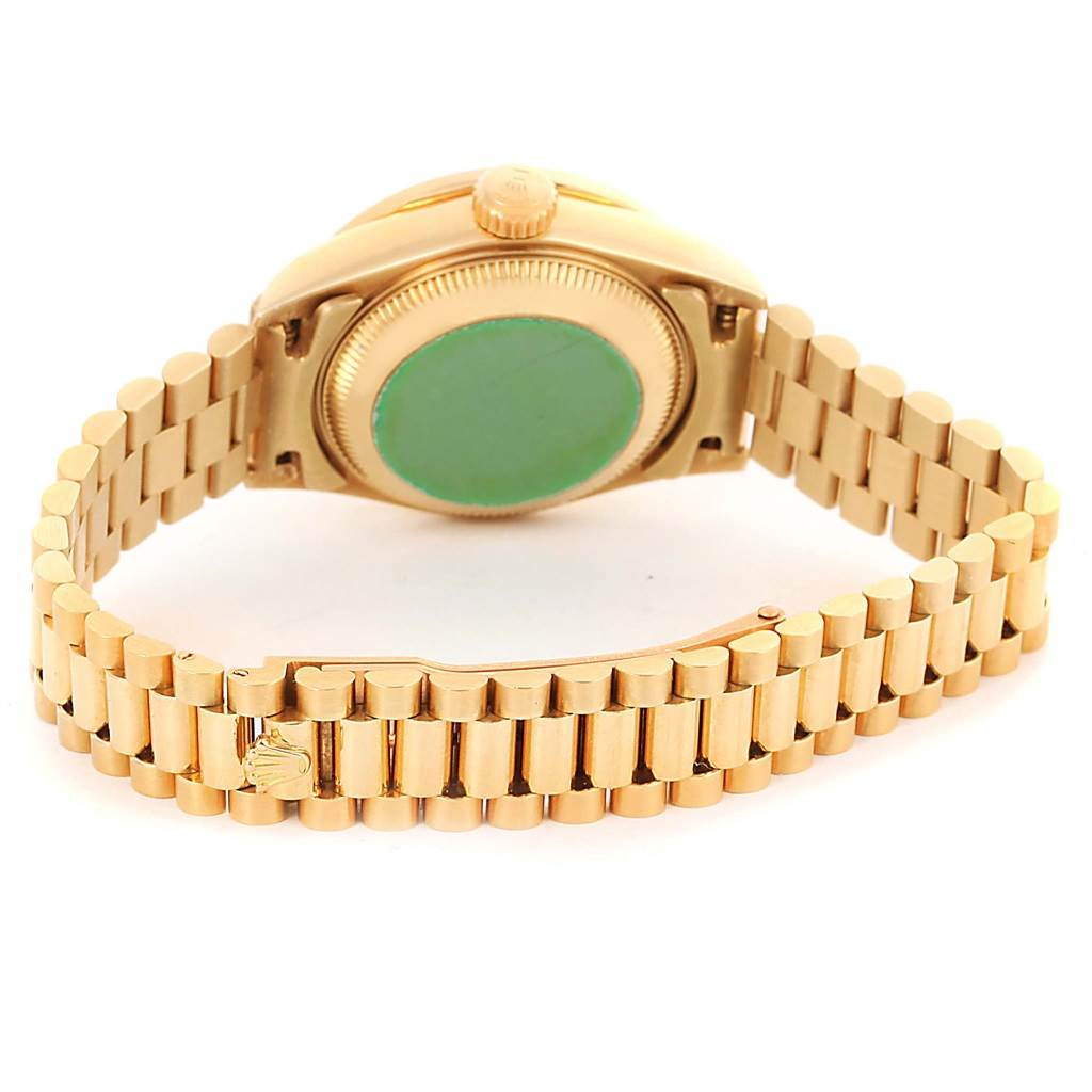 The image shows the back case and bracelet of a Rolex President 69138 Women's Yellow Gold Blue Dial 69138 Women's Yellow Gold Blue Dial model watch.