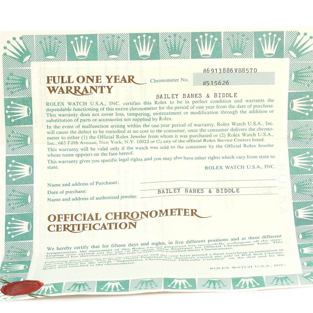 This image shows the warranty and certification papers for the Rolex President 69138 Women's Yellow Gold Blue Dial 69138 Women's Yellow Gold Blue Dial model watch.