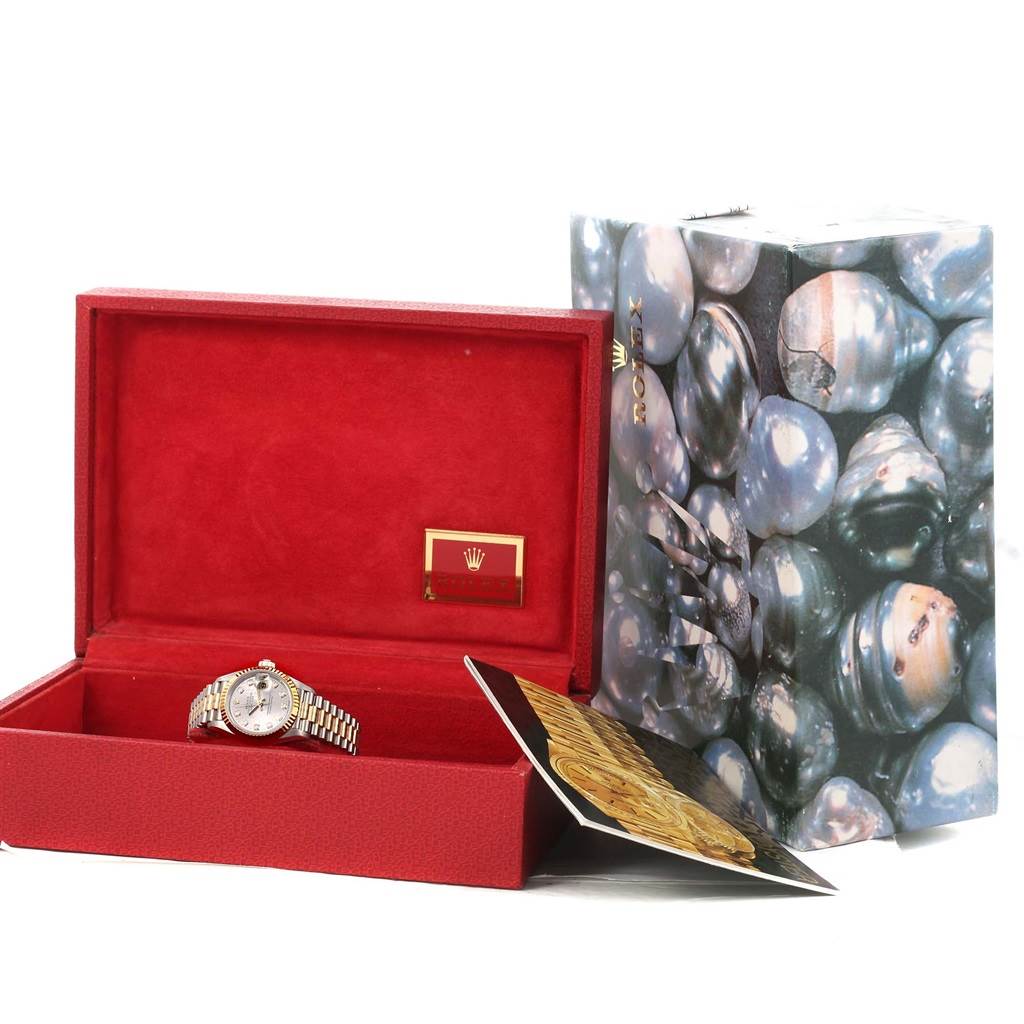 The image shows a Rolex President 69179 Women's White Gold Silver Dial 69179 Women's White Gold Silver Dial model watch in its red display box, accompanied by a booklet and an outer decorative box.