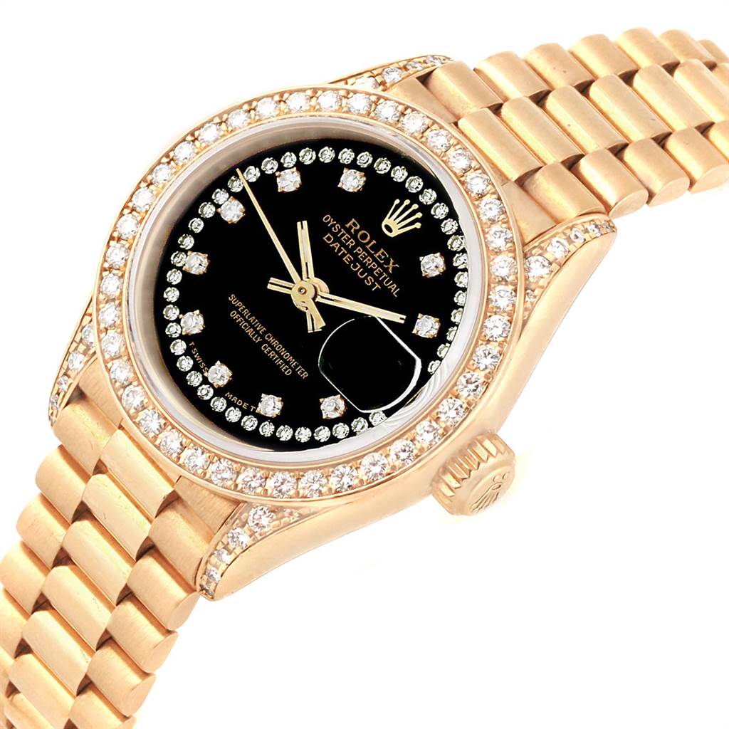 The image shows a close-up angled view of the Rolex President 69238 Women
s Yellow Gold Black Dial 69238 Women
s Yellow Gold Black Dial model, displaying the dial, bezel, and part of the bracelet.