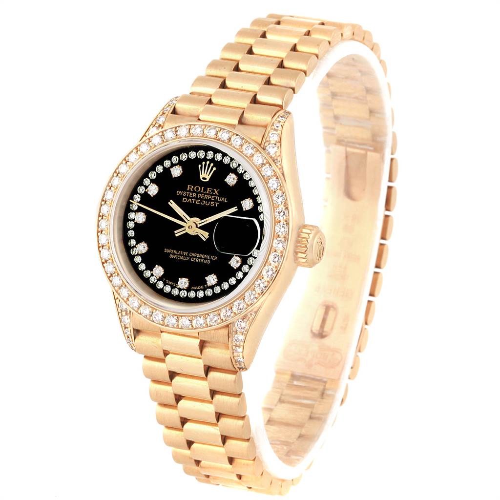 The Rolex President 69238 Women
s Yellow Gold Black Dial 69238 Women
s Yellow Gold Black Dial model watch is shown at an angled view highlighting its gold band, black dial, and diamond-encrusted bezel.