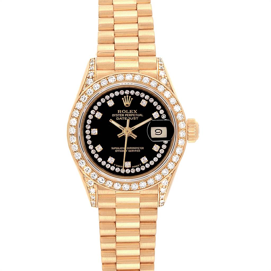 The image shows a Rolex President 69238 Women
s Yellow Gold Black Dial 69238 Women
s Yellow Gold Black Dial model watch from a top-down angle, highlighting the bezel, dial, crown, and bracelet.