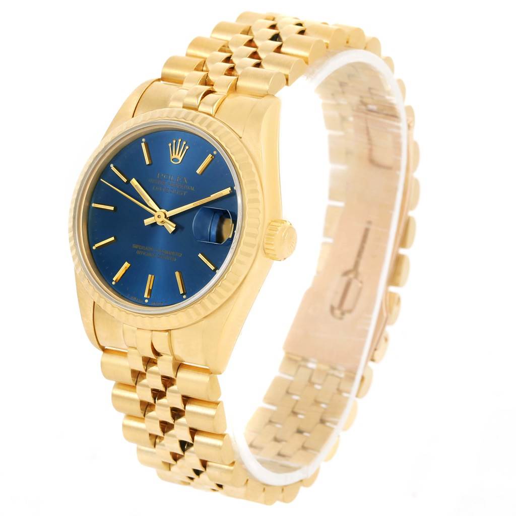 The Rolex President 68278 Women's Yellow Gold Blue Dial 68278 Women's Yellow Gold Blue Dial watch is shown at an angled top view, highlighting its gold bracelet, blue dial, and fluted bezel.
