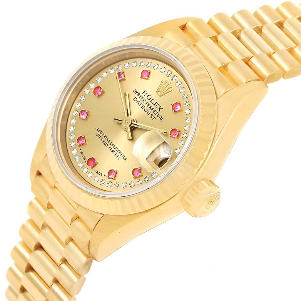 This image shows the Rolex President 69178 Women's Yellow Gold Champagne Dial 69178 Women's Yellow Gold Champagne Dial model watch from an angled view, displaying its gold case, dial, bracelet, and crown.