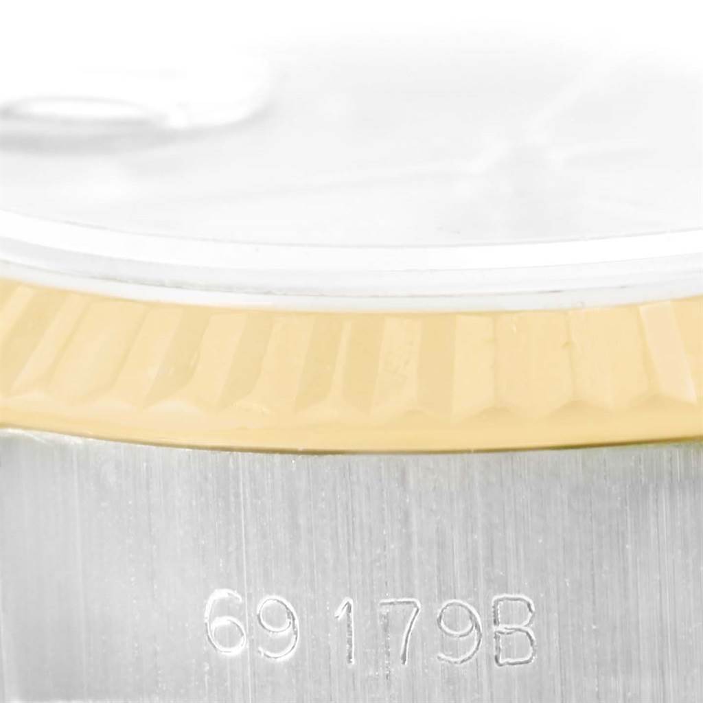 The image shows a close-up of the side of the Rolex President 69179 Women's White Gold Brown Dial 69179 Women's White Gold Brown Dial model watch, highlighting the case serial number "69179B".