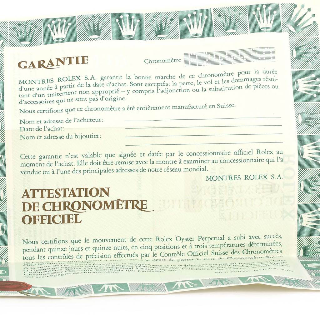 This image shows the warranty and chronometer certification documents for a Rolex President 69179 Women's White Gold Brown Dial 69179 Women's White Gold Brown Dial model watch.