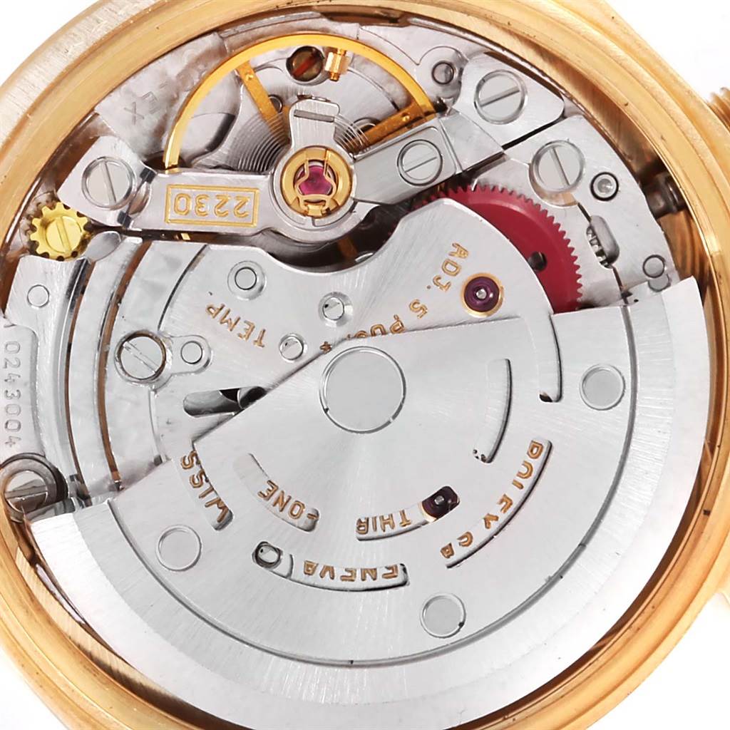 The image shows a close-up view of the movement mechanism of a Rolex President 76198 Women's Yellow Gold Champagne Dial 76198 Women's Yellow Gold Champagne Dial model watch.