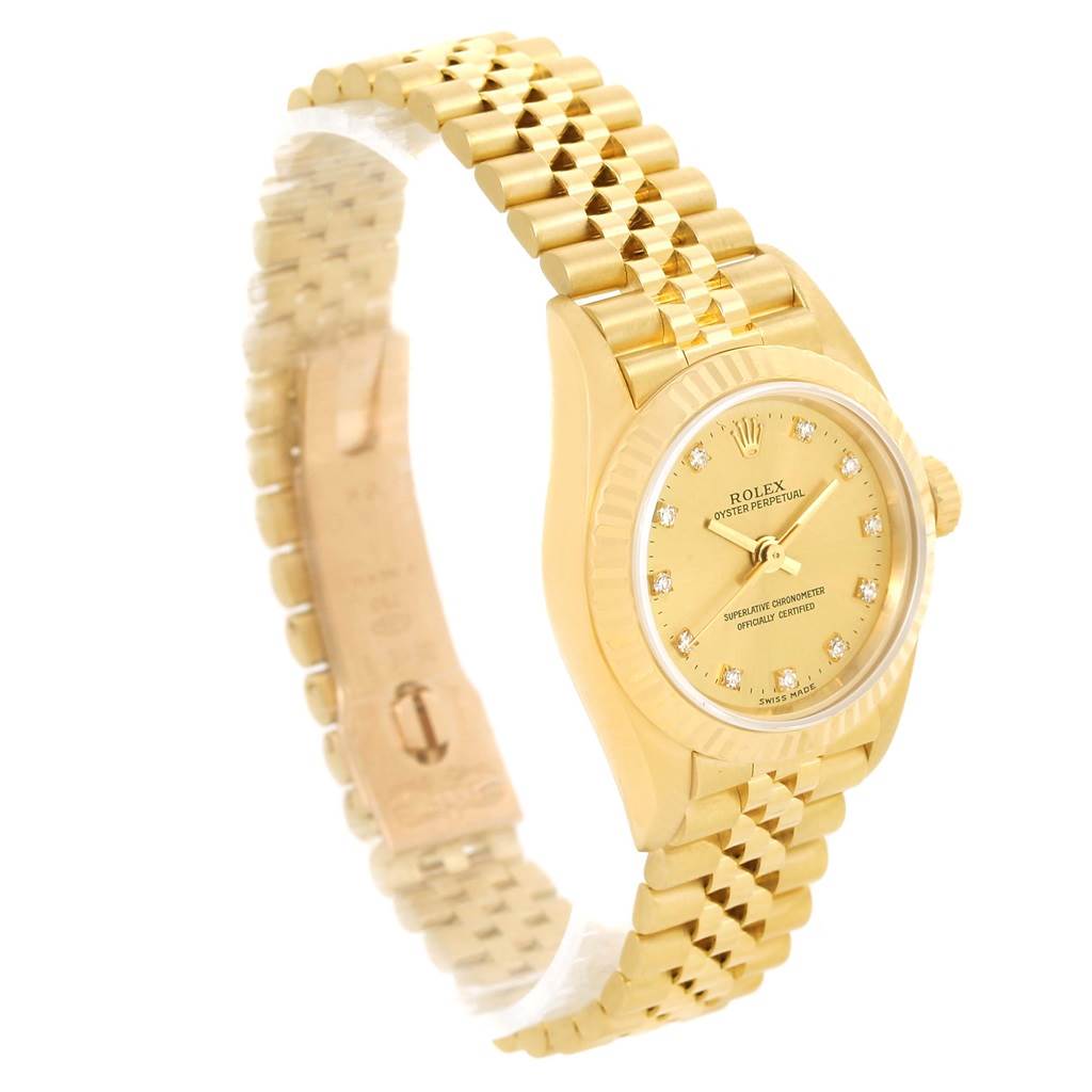 The Rolex President 76198 Women's Yellow Gold Champagne Dial 76198 Women's Yellow Gold Champagne Dial model watch is shown at an angled side view, highlighting the dial, fluted bezel, crown, and the gold bracelet.