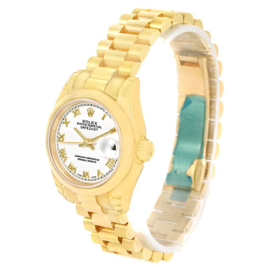 This Rolex President 179168 Women's Yellow Gold White Dial 179168 Women's Yellow Gold White Dial model watch is shown from a side angle, displaying the bracelet, bezel, dial, and crown.