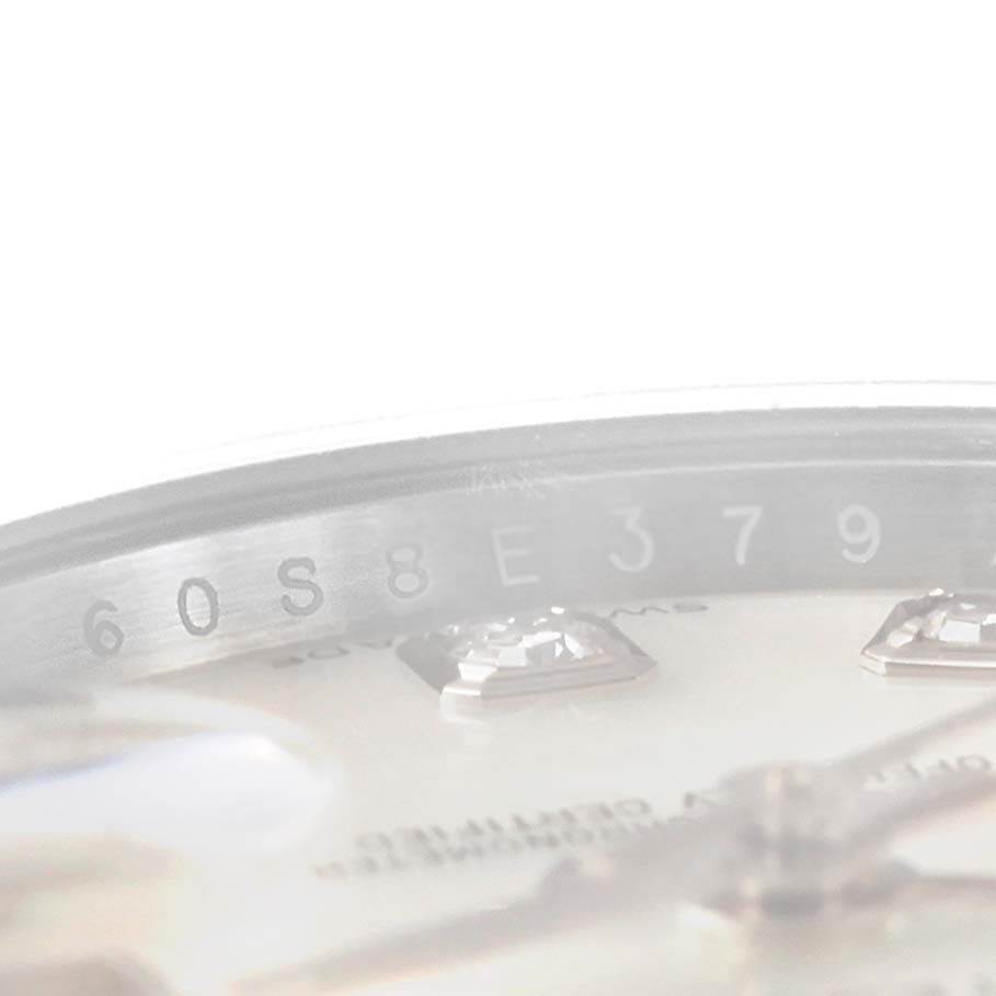 This image shows a close-up of the serial number engraving on the inner bezel of a Rolex President 179159 Women's White Gold Mother of Pearl Dial 179159 Women's White Gold Mother of Pearl Dial watch.