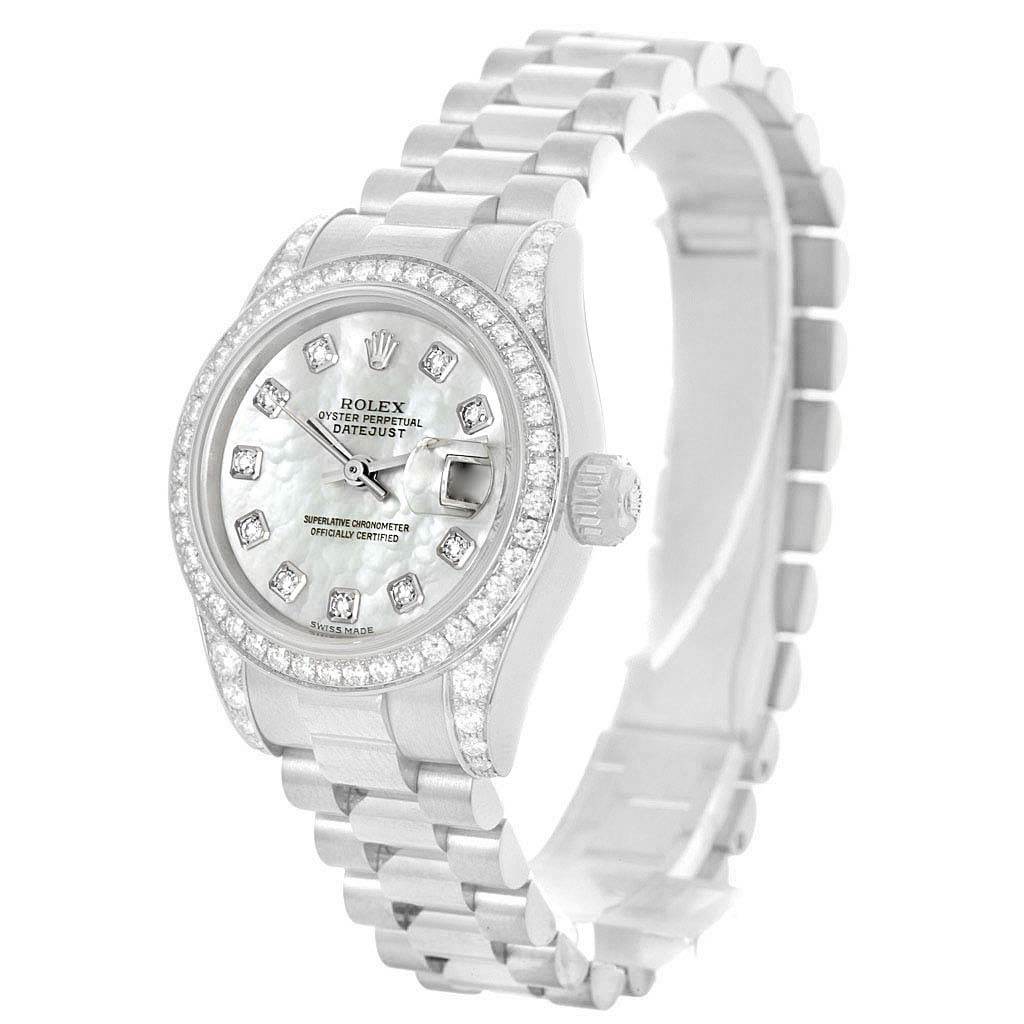 The image shows a Rolex President 179159 Women's White Gold Mother of Pearl Dial 179159 Women's White Gold Mother of Pearl Dial model watch at an angled view, highlighting the face, bezel, crown, and bracelet.