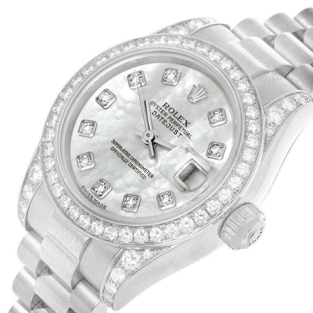 The image shows a close-up angle of a Rolex President 179159 Women's White Gold Mother of Pearl Dial 179159 Women's White Gold Mother of Pearl Dial model watch, highlighting its diamond-encrusted bezel, dial, and bracelet.