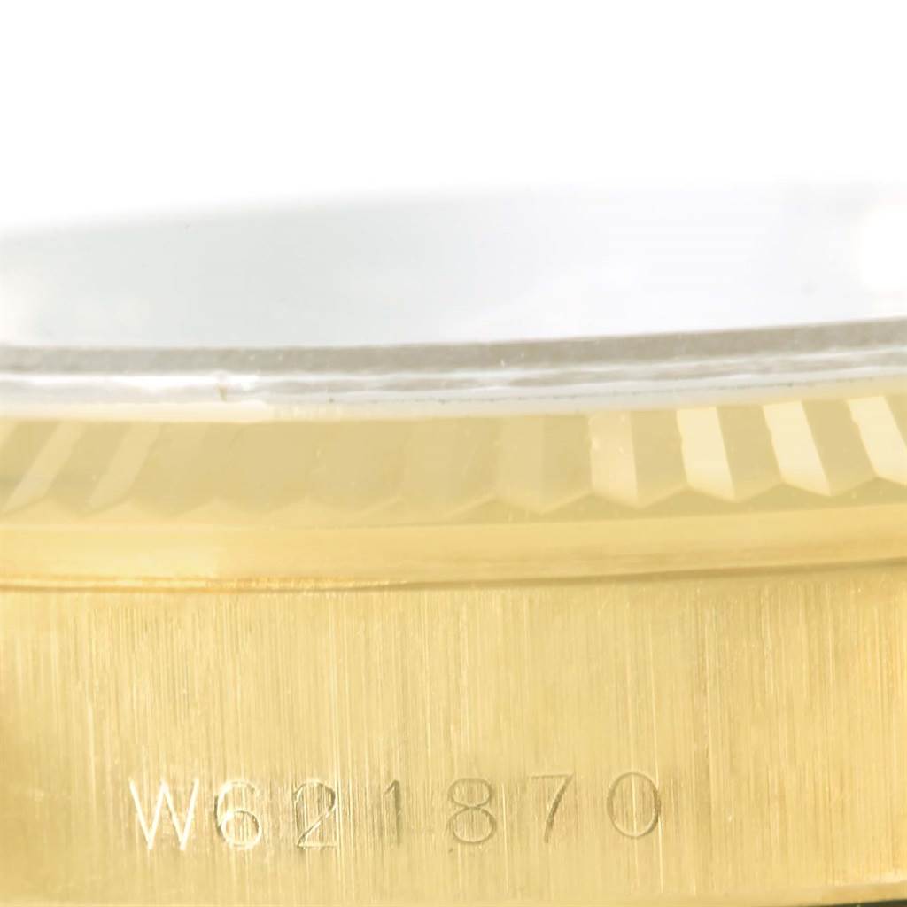 The image shows a close-up of the side and bezel of a Rolex President 68278 Women's Yellow Gold Champagne Dial 68278 Women's Yellow Gold Champagne Dial watch with a visible serial number.
