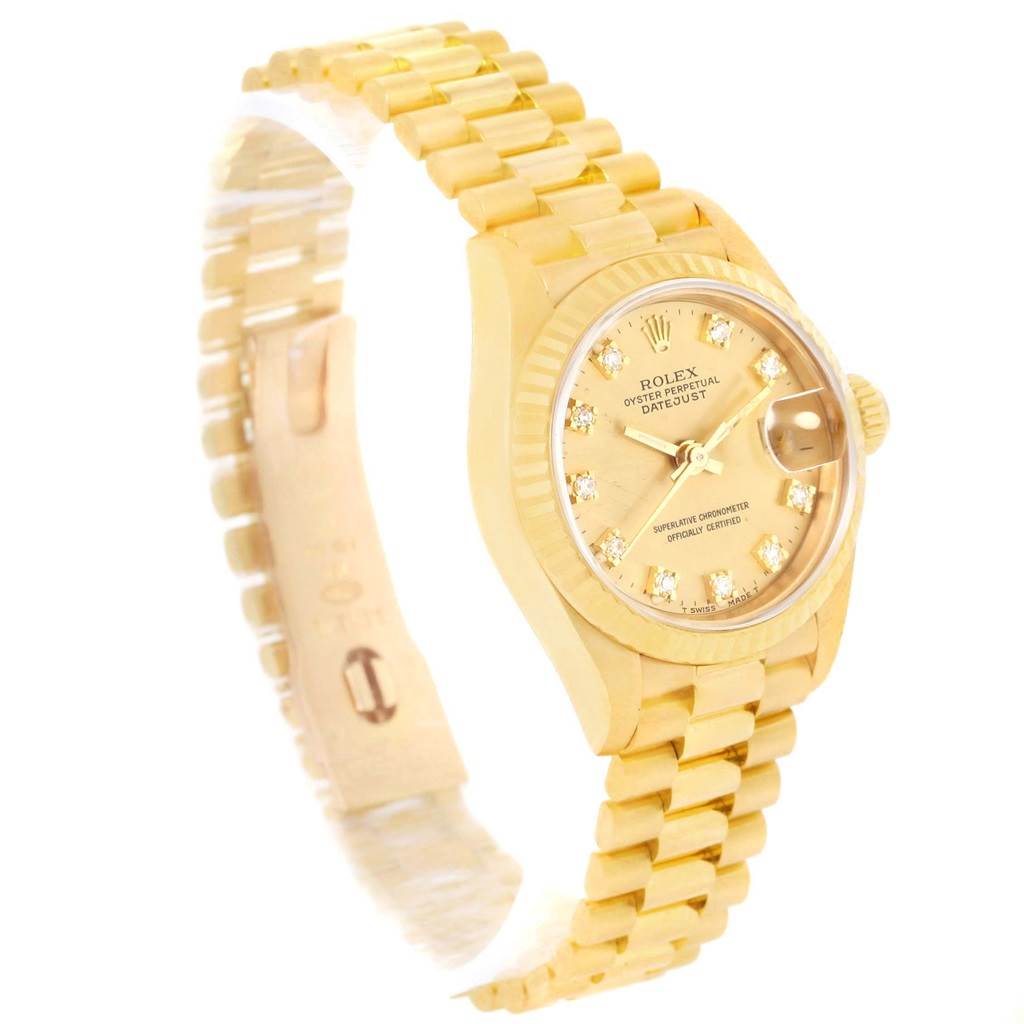 This image shows an angled view of the Rolex President 69178 Women's Yellow Gold Champagne Dial 69178 Women's Yellow Gold Champagne Dial model watch, highlighting the gold bracelet and diamond-studded dial face.