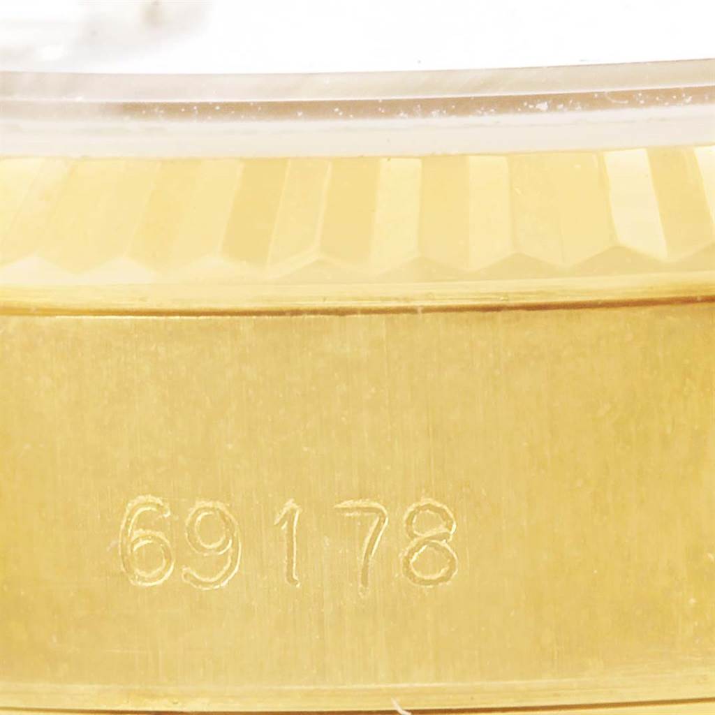 This image shows a close-up of the engraved reference number on the case of a Rolex President 69178 Women's Yellow Gold Champagne Dial 69178 Women's Yellow Gold Champagne Dial model watch.