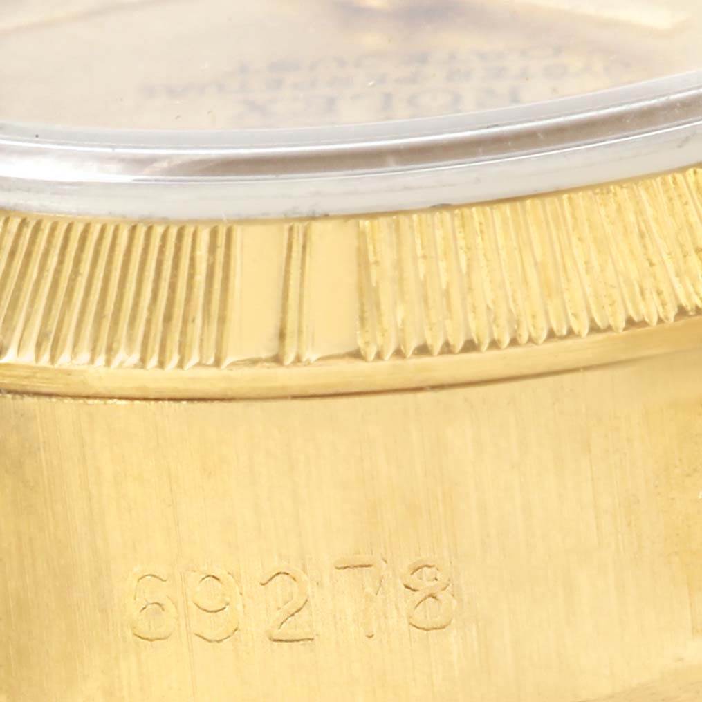 The image shows a close-up of the Rolex President 69278 Women's Yellow Gold Champagne Dial 69278 Women's Yellow Gold Champagne Dial model watch's bezel and case with the reference number, 69278.