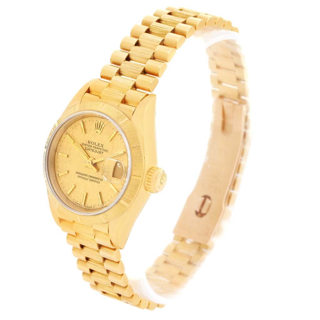 The image shows a side angle view of the Rolex President 69278 Women's Yellow Gold Champagne Dial 69278 Women's Yellow Gold Champagne Dial model watch, highlighting the case, dial, bezel, crown, and bracelet.