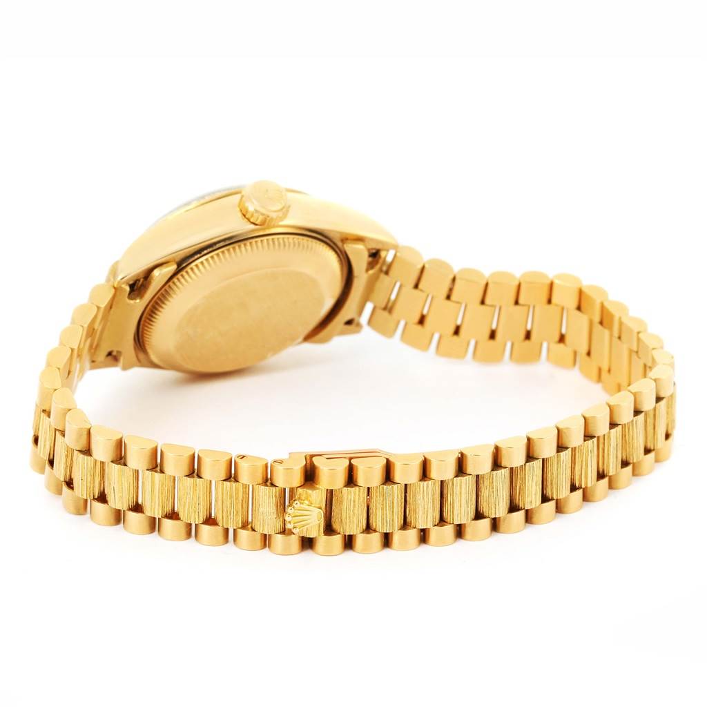 This image shows the back view and bracelet of a Rolex President 69278 Women's Yellow Gold Champagne Dial 69278 Women's Yellow Gold Champagne Dial model watch in gold.