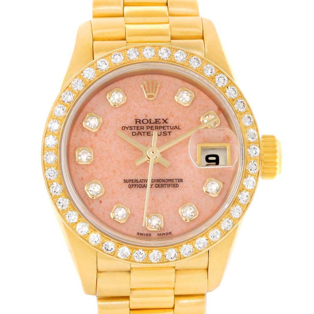 This image shows the front view of a Rolex President 69138 Women's Yellow Gold Pink Dial 69138 Women's Yellow Gold Pink Dial model watch with a diamond-studded bezel, pink dial, and gold links.