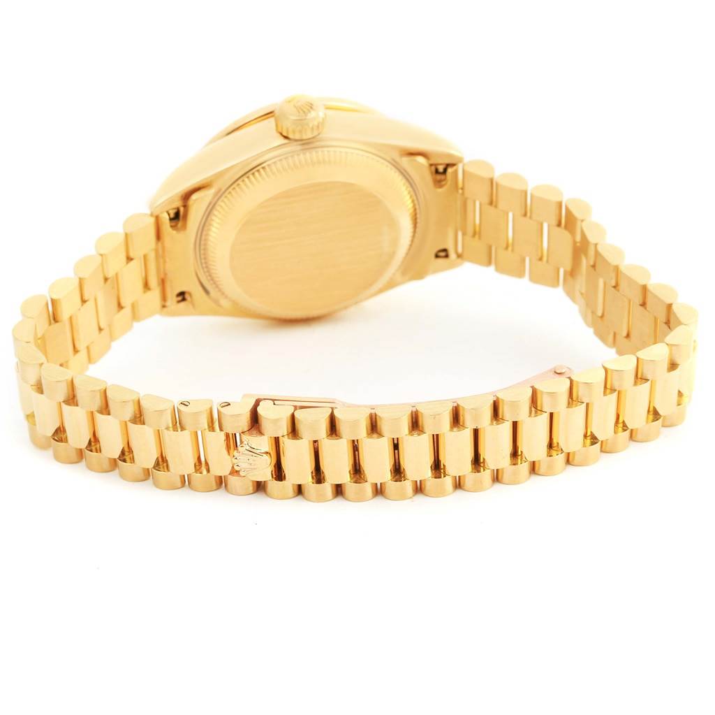 This image shows the back view of a Rolex President 69078 Women's Yellow Gold Silver Dial 69078 Women's Yellow Gold Silver Dial model watch, highlighting the caseback and the bracelet.