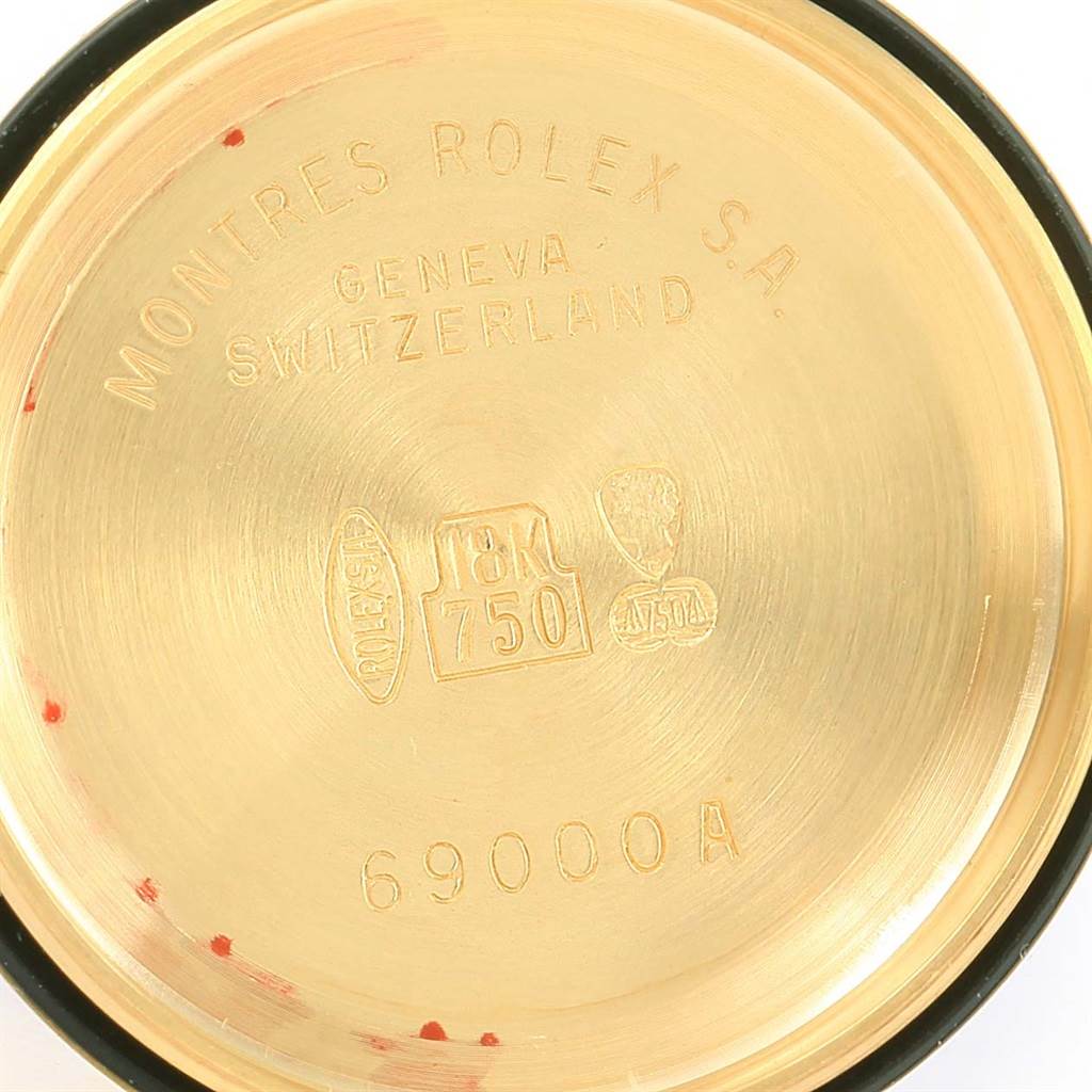 The image shows the inside case back of a Rolex President 69078 Women's Yellow Gold Silver Dial 69078 Women's Yellow Gold Silver Dial model watch, showcasing engraving details and gold purity stamps.